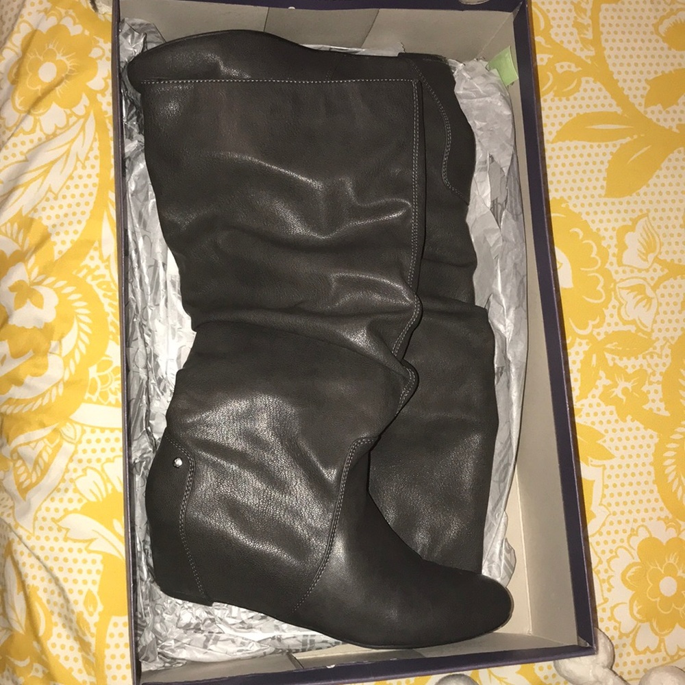 Grey Jennifer Lopez Wedge boots.